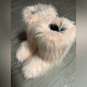 pink fluffy boots. -